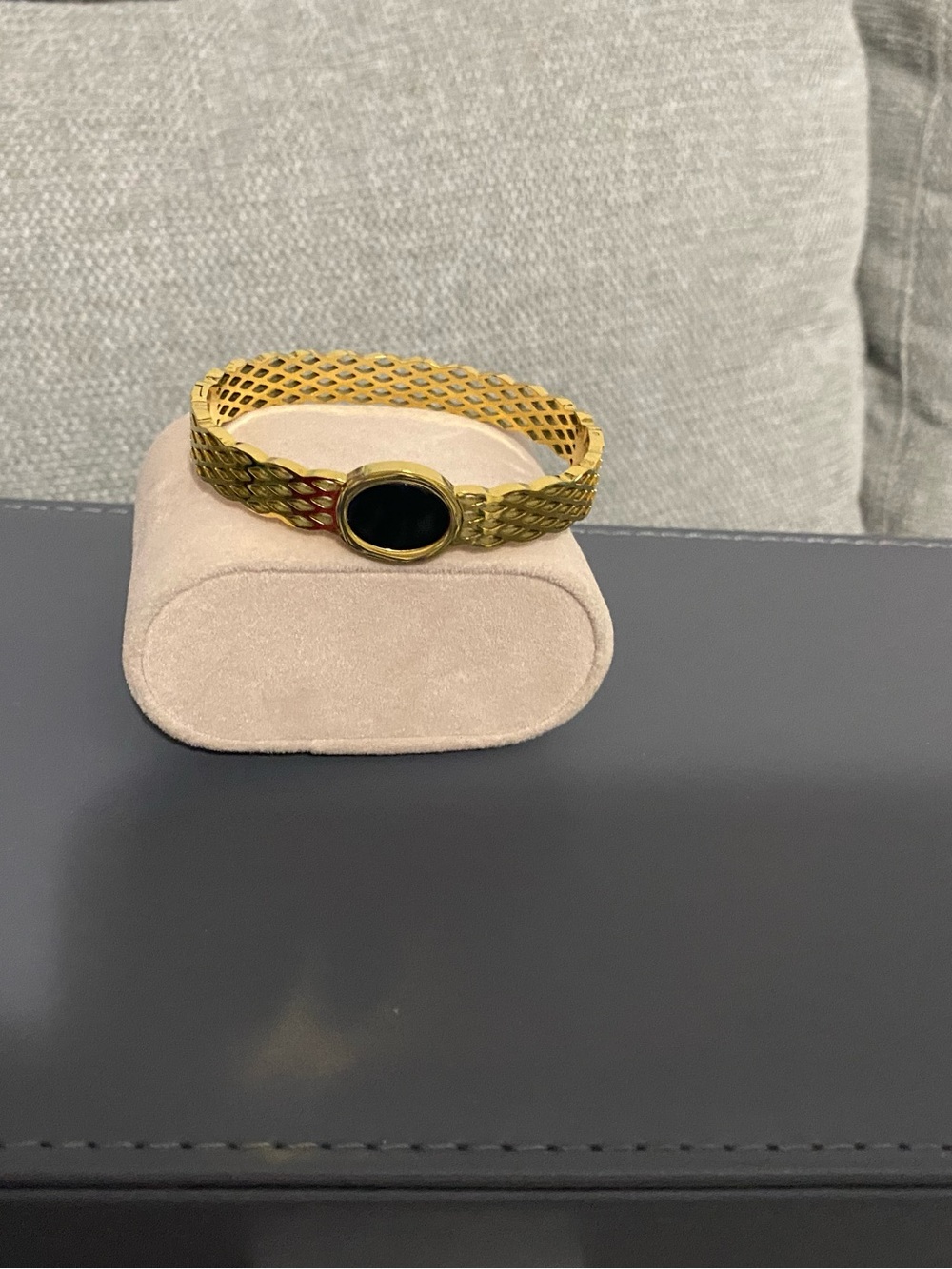 Gold Toned Mesh Bracelet with Black Oval Center